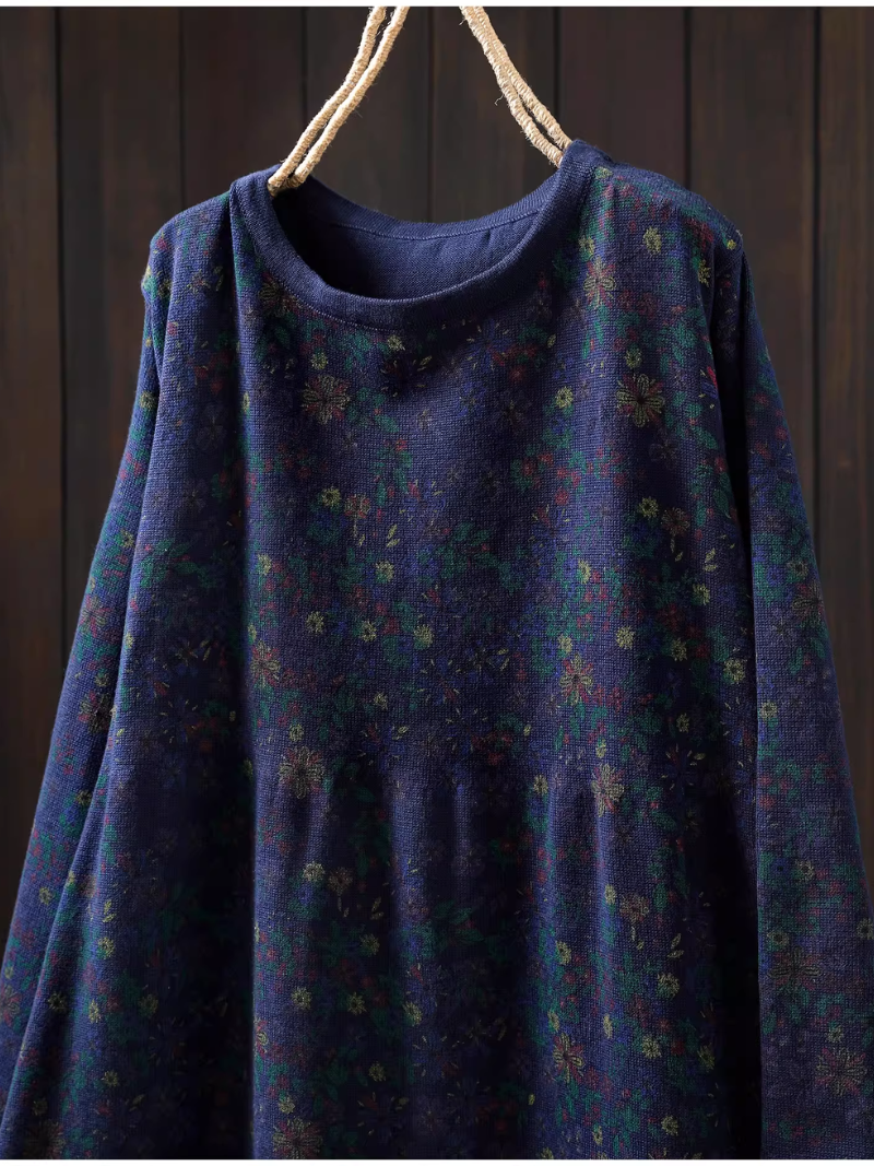 Elegant floral sweater dress in relaxed A-line silhouette for winter