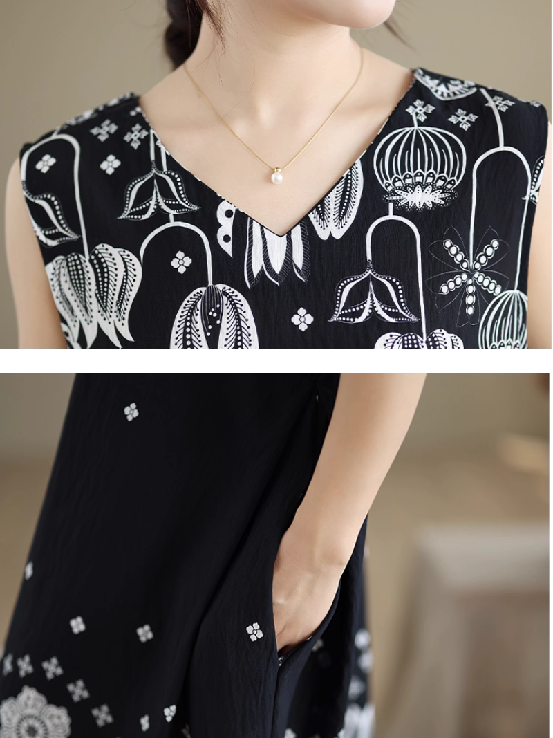 Black sleeveless top with white floral pattern 