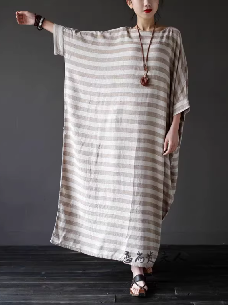 retro flair. The long skirt gracefully flows for a flattering look 