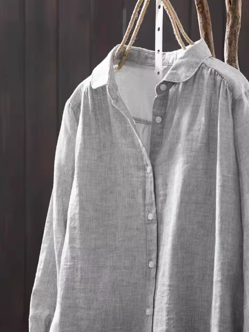 Minimalist cotton-linen button-down blouse with relaxed silhouette for elevated everyday style