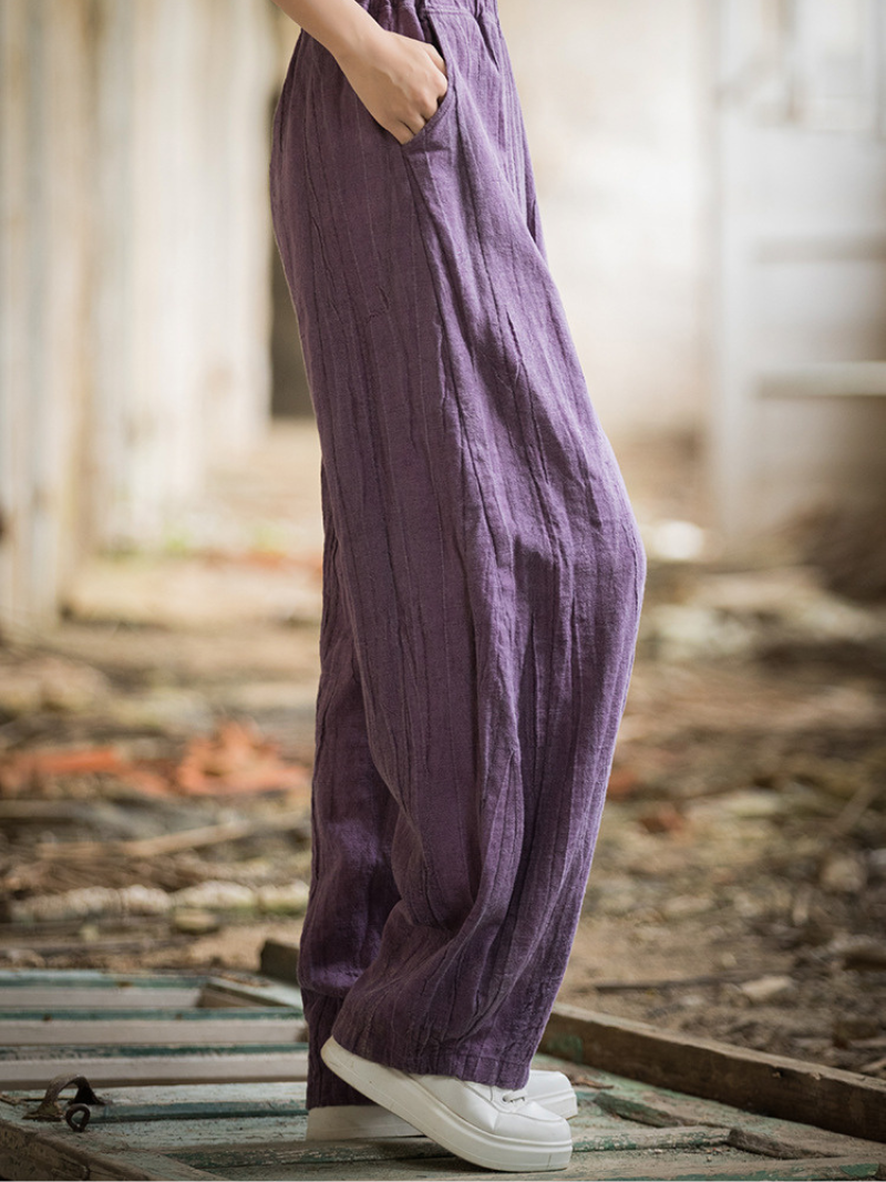  wearing purple pants 