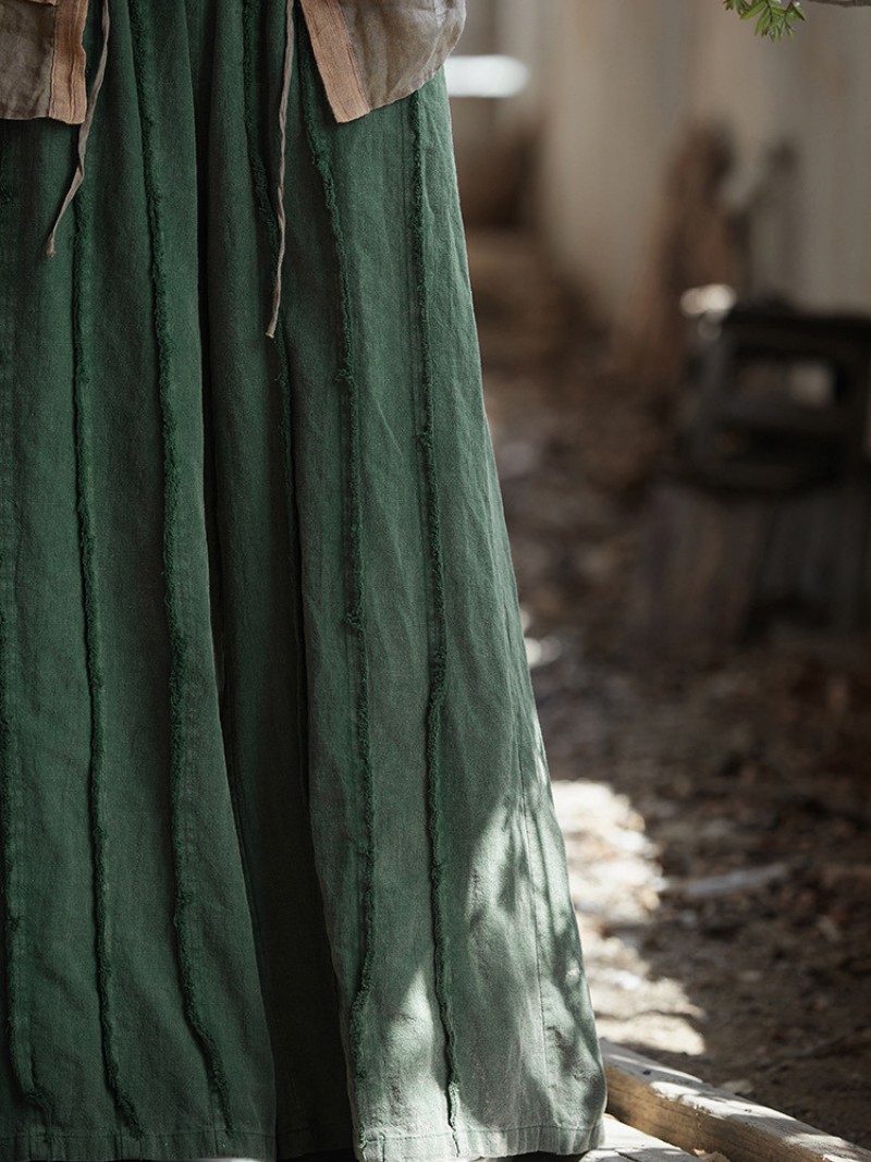 Green fabric with a blurred background