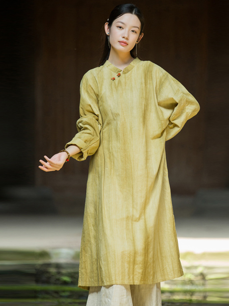 Woman wearing a light yellow traditional outfit Long Sleeves 